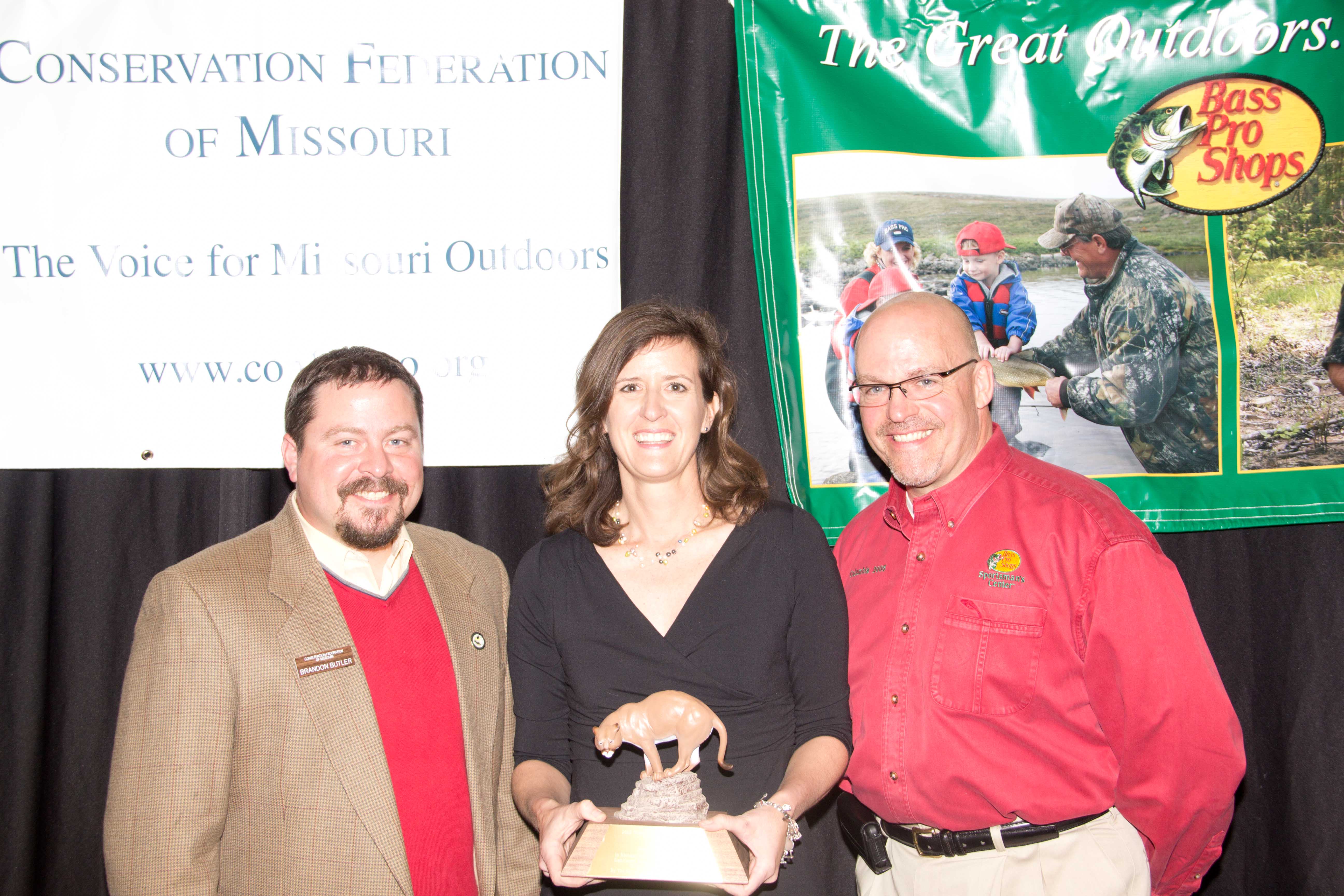 Joanie Straub, center, received the Conservation Communicator of the Year Award