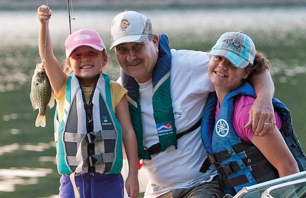 Charlie Nelson and granddaughters fishing