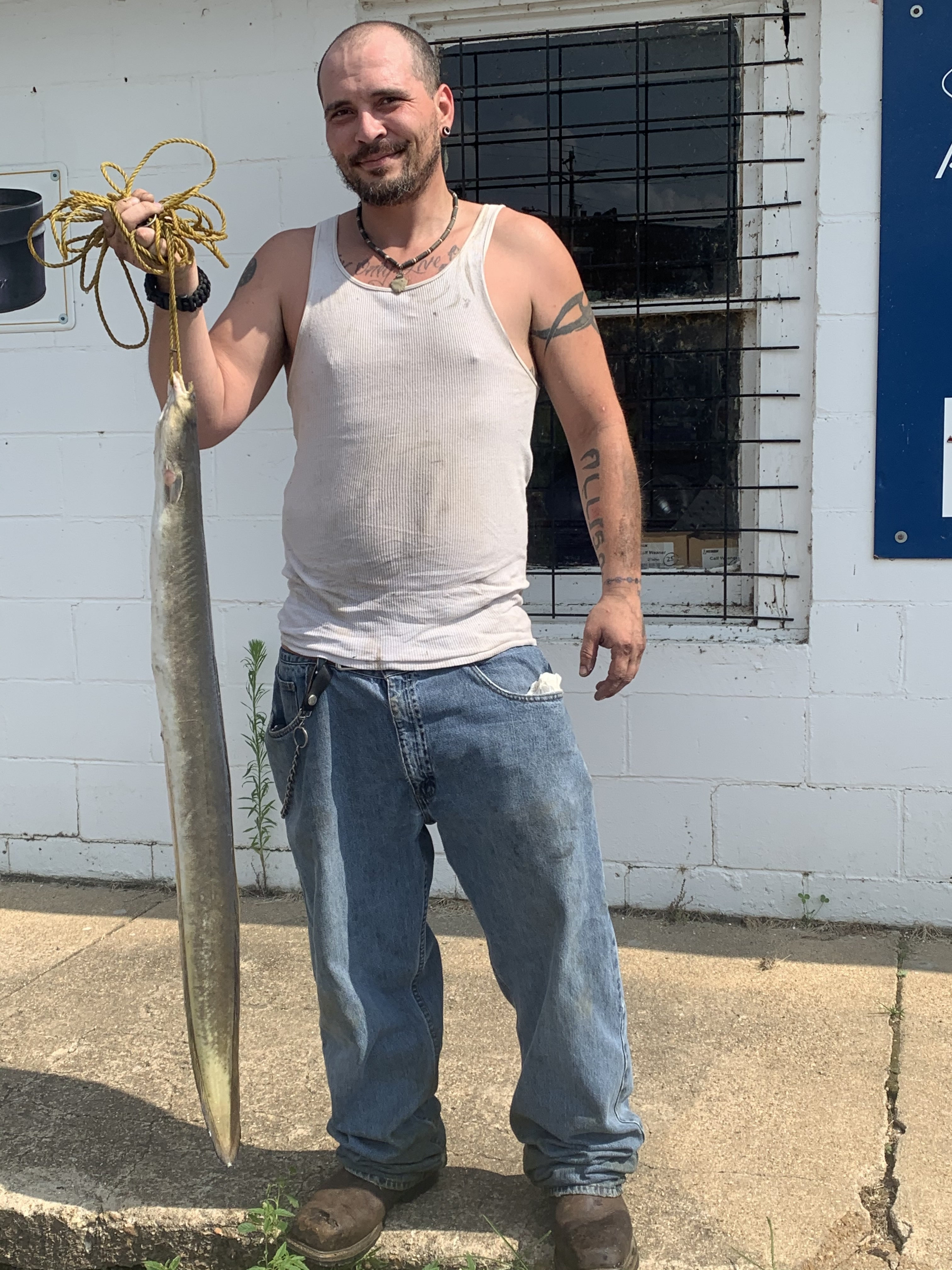 Carlin Allison holds his state record American eel