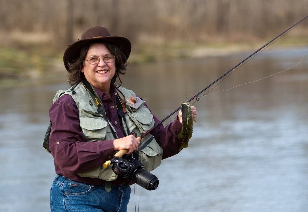 woman trout fishing