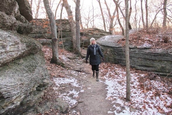 woman walking a trail