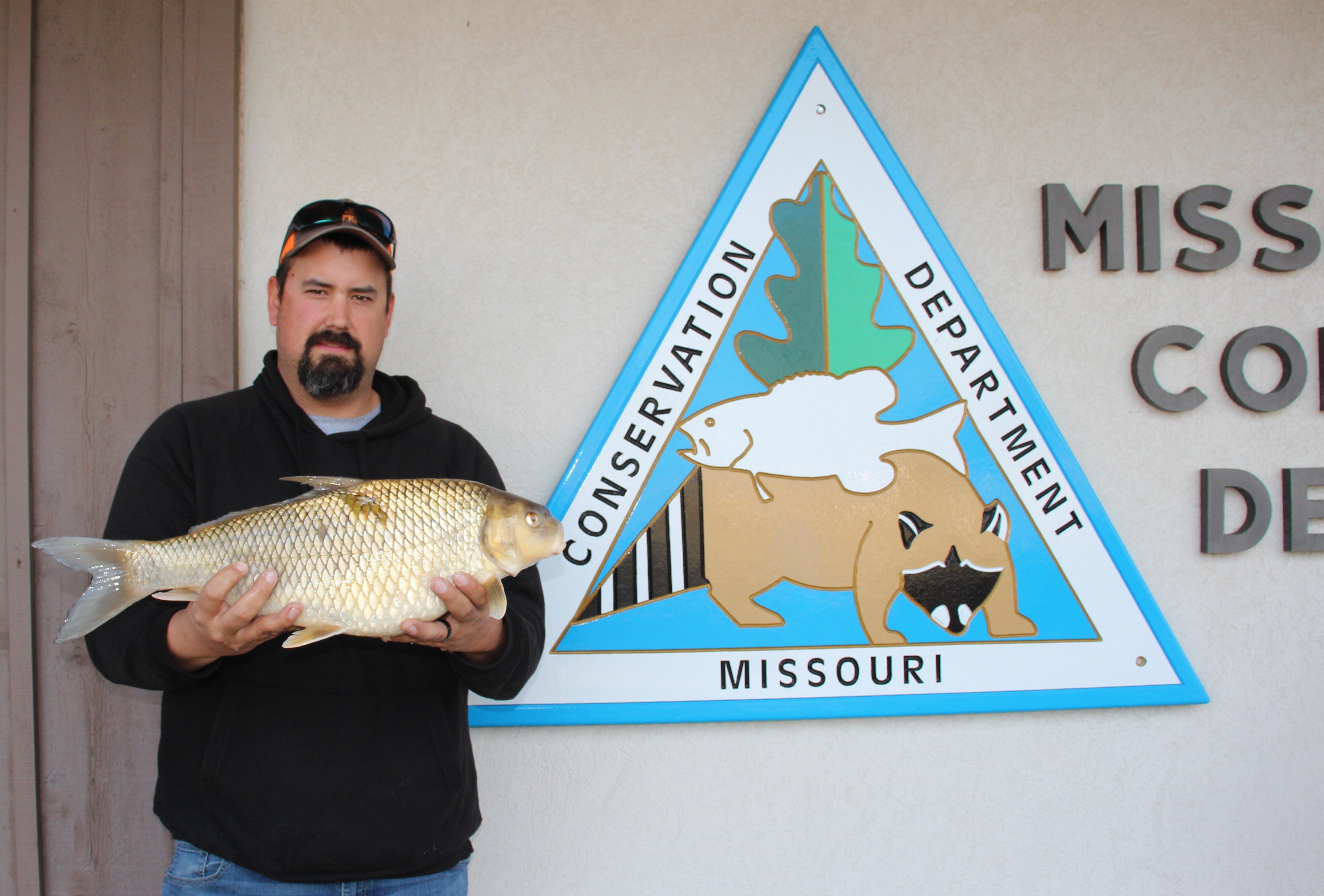 Josh Lawmaster holding quillback fish.
