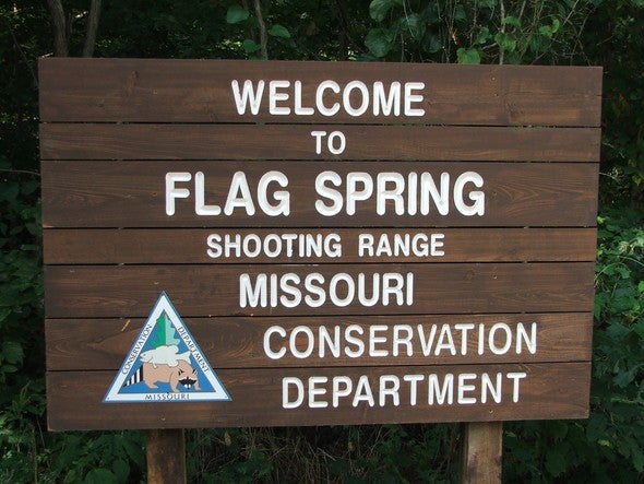 Flag Spring Shooting Range sign