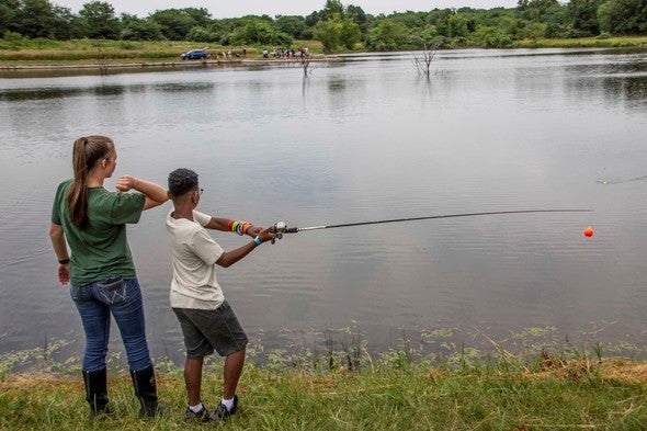 teaching a kid to fish