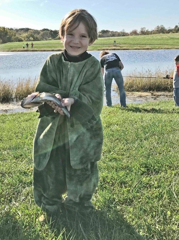 child with fish