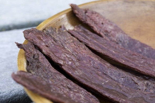 Deer jerky on a plate