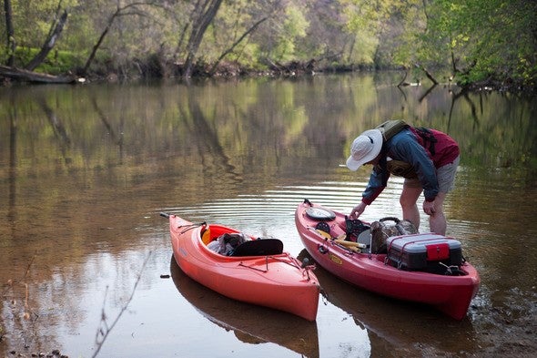 Staff with two kayaks