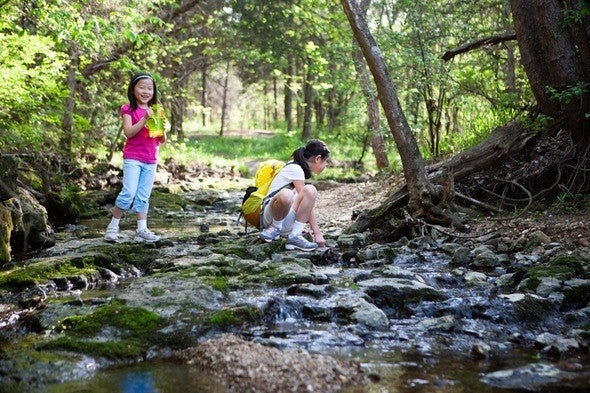two girls in creek