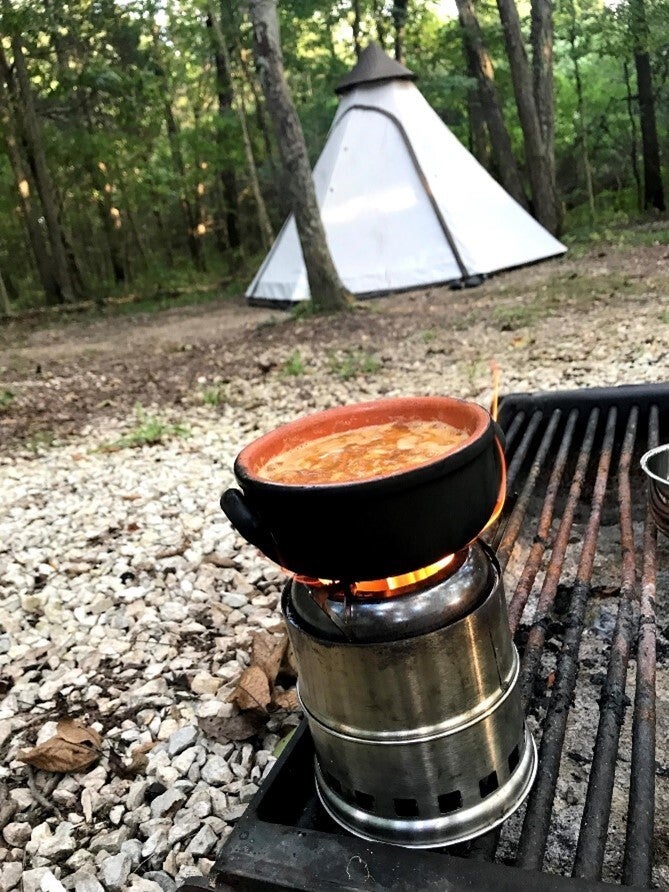 Cooking outdoors during camping