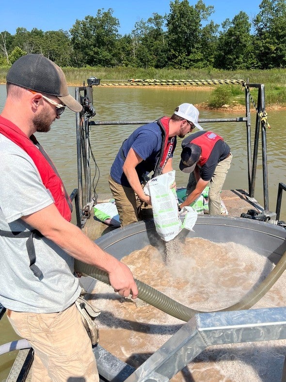 MDC staff working at White Ranch Conservation Area lake