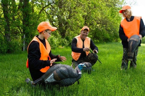 Hunters with turkey decoys