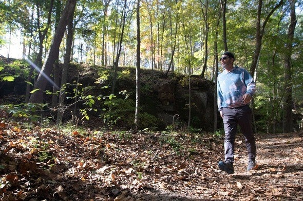 Man walks trail at Rockwoods Reservation