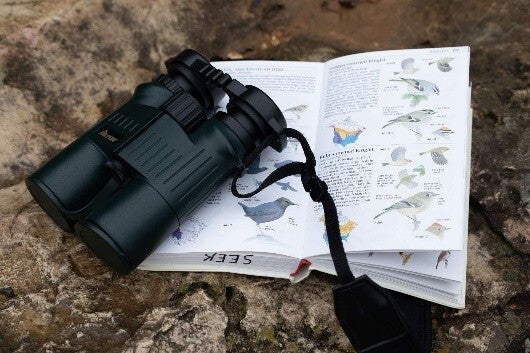  birding binoculars and book