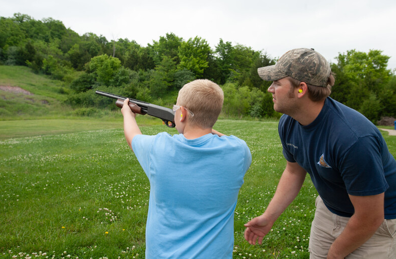 shooter practicing with staff at the MDC Lake City Range 