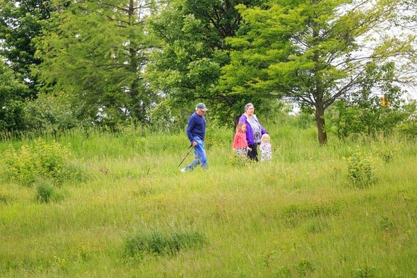 family walking on trail