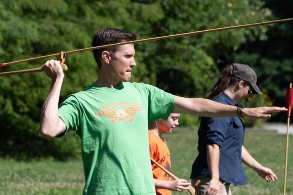 person throwing atlatl