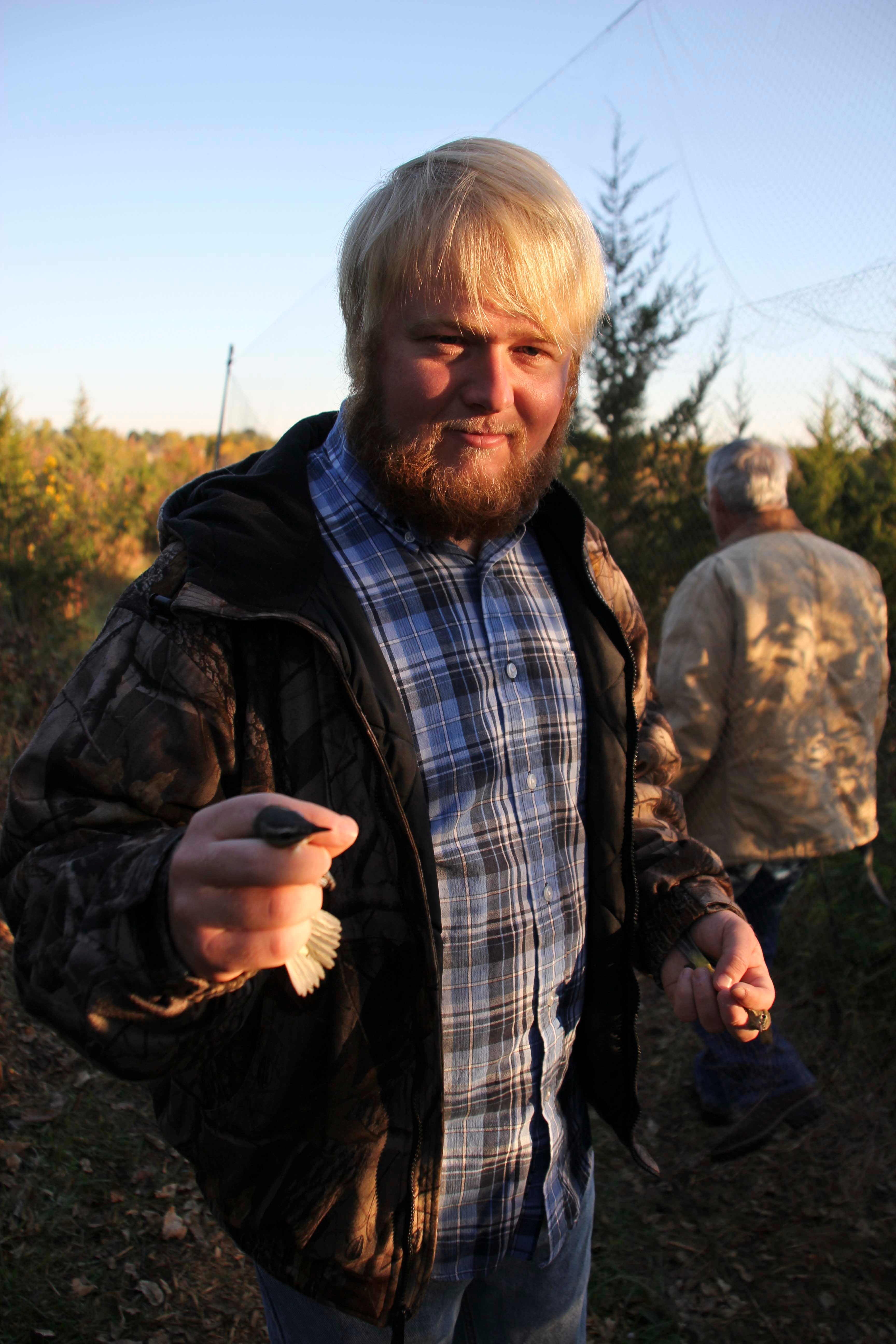 Jacob Decker of Missouri Western State University doing birdbanding