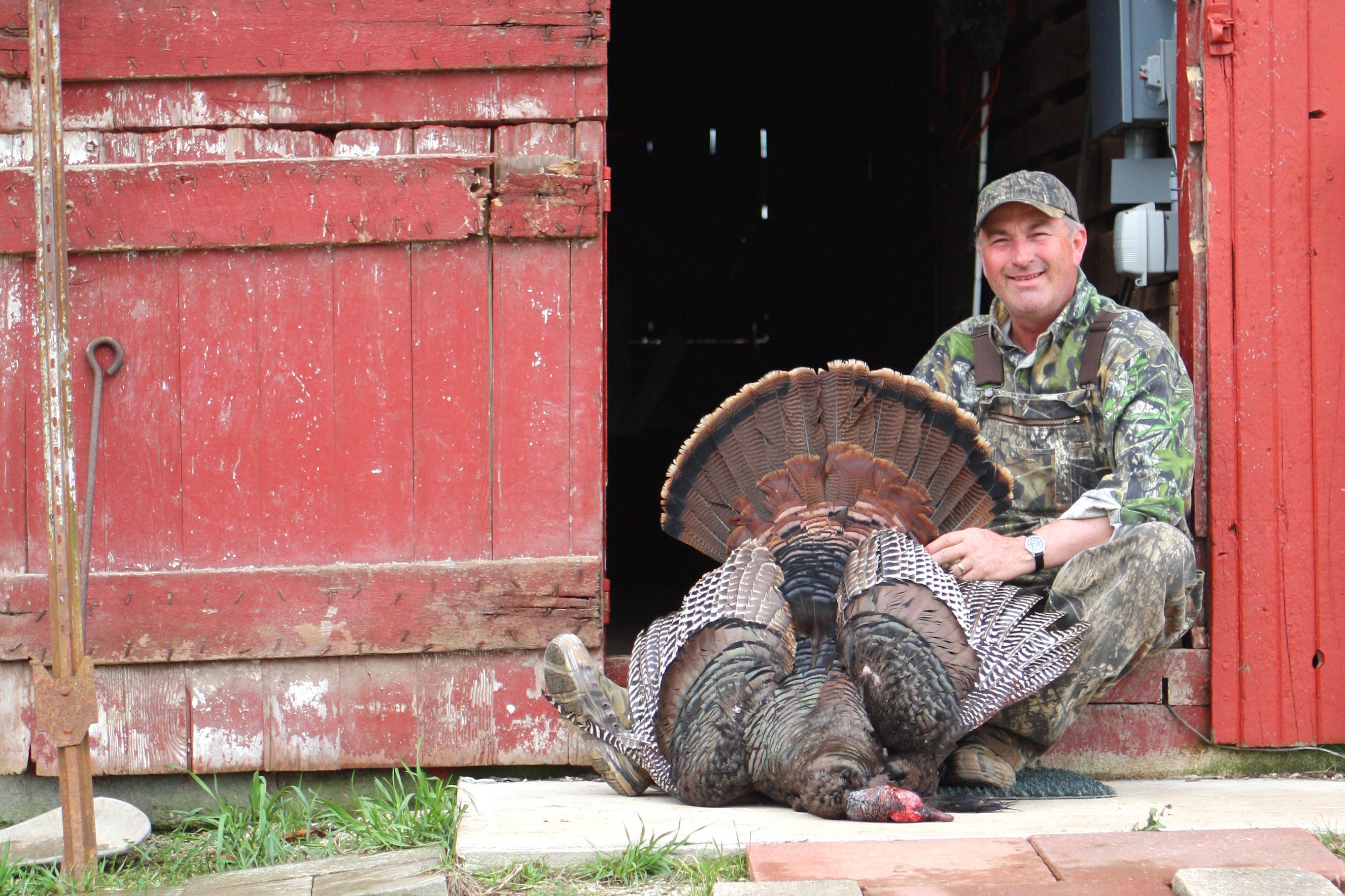 David W. Murphy with a turkey gobbler he shot on his farm.