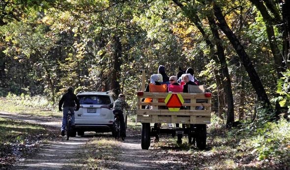 People on a tour at Poosey Conservation Area.