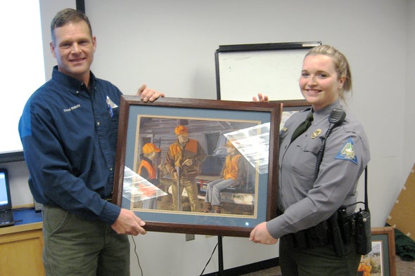 Conservation Agent Patrice Reese receiving the 2016 Conservation Agent Hunter Education Instructor of the Year for the St. Louis Region Award 