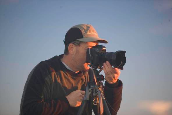 Photographer Matt Miles taking a photo