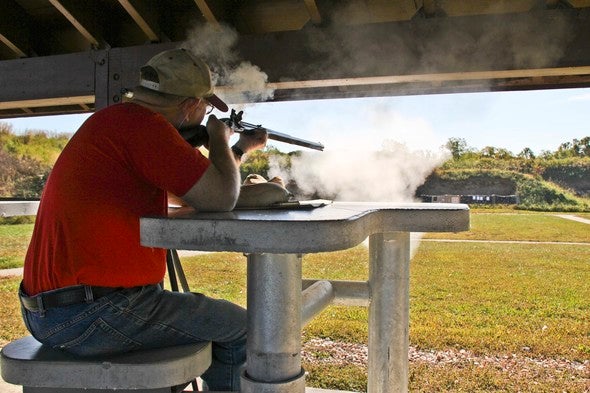 Man shooting on the shooting range.
