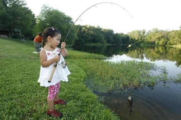 Little girl fishing.
