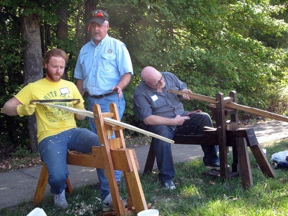 People making longbows.