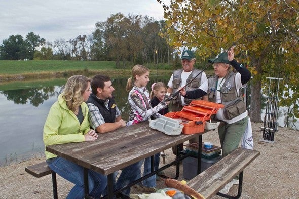 MDC staff teach a family to fish.