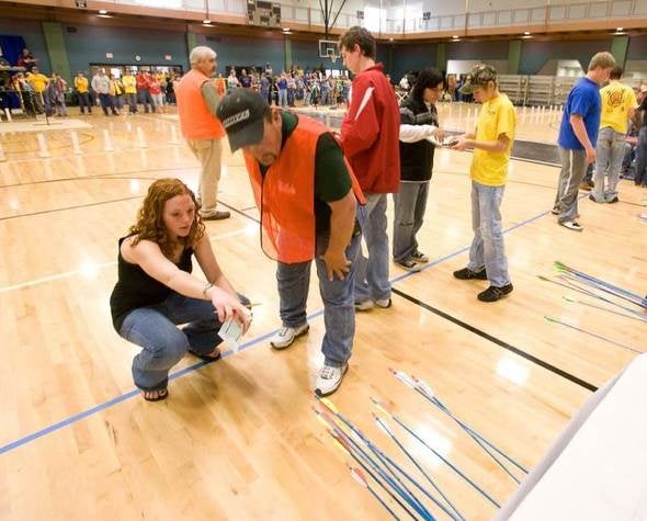 MONASP instructor working with a student.