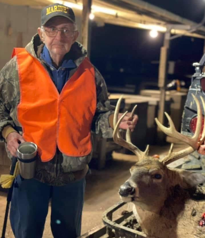 Robert McGrath with harvested buck