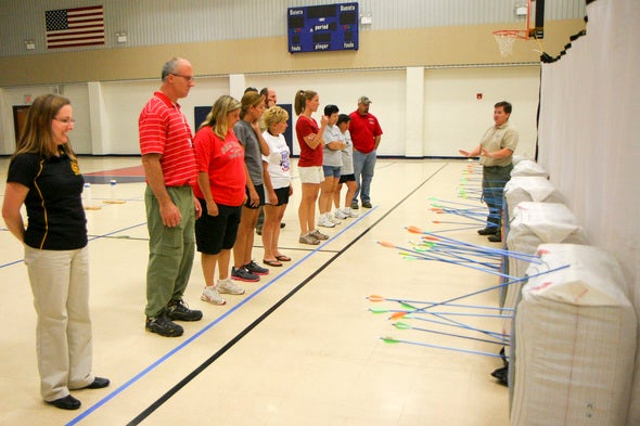 Teachers being trained to be archery instructors.