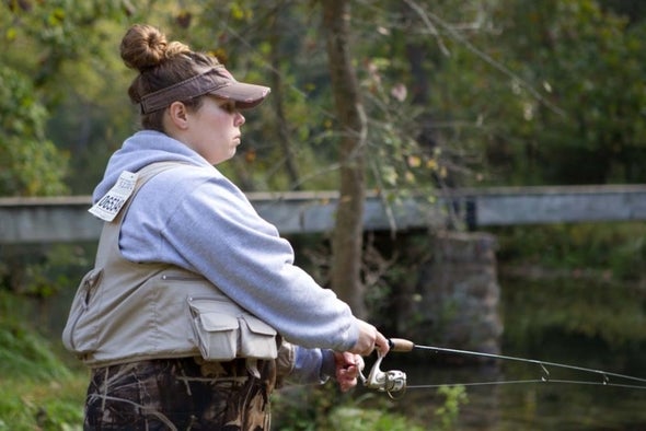 woman fishing.