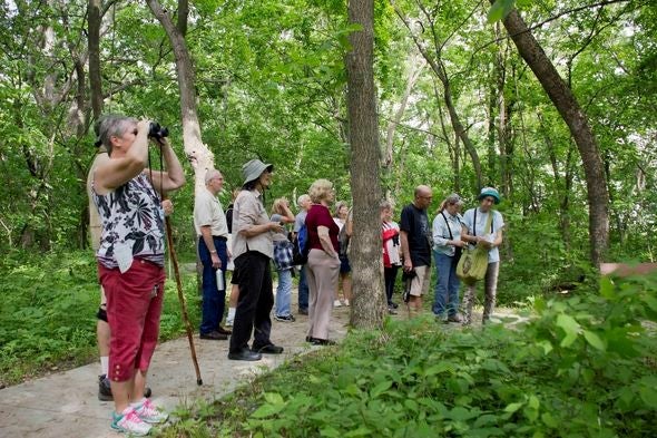 Birders on trail at Burr Oak Woods Conservation Area 