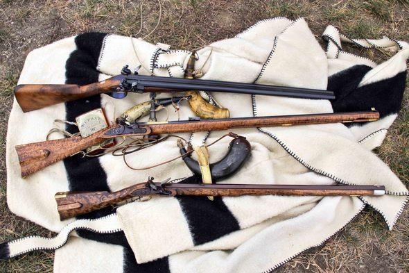 Black powder guns.