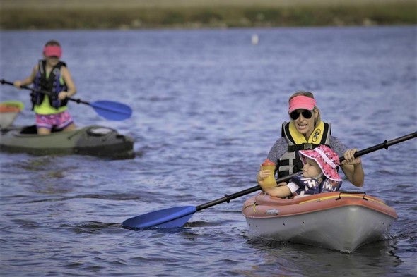 family kayaking