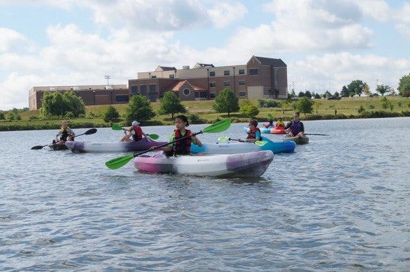 Group kayaking in Como