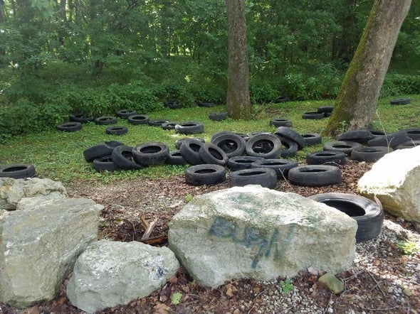 illegal dump of tires at Stringtown Bridge Access