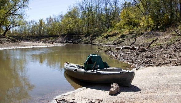 kayak docked on river