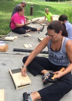 teachers building bathouses