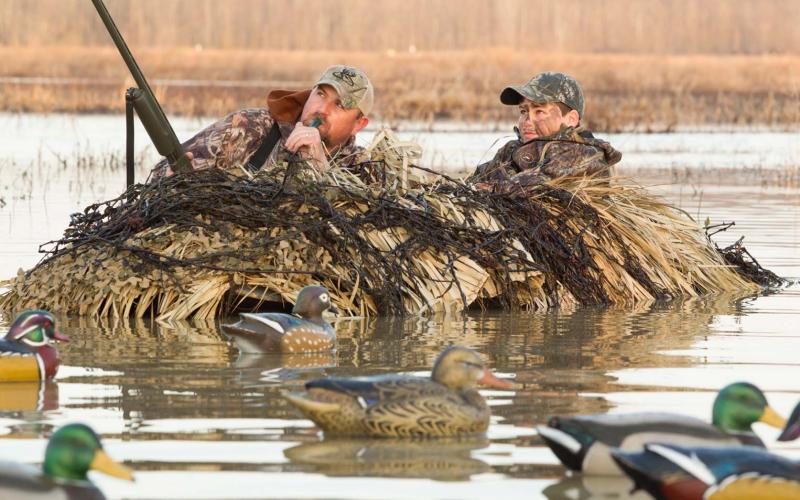 two duck hunters in blind