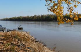 A boat in the Missouri River near the boat ramp at Mokane Access