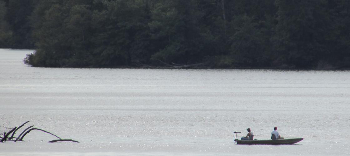 Anglers in a boat on Hunnewell Lake CA