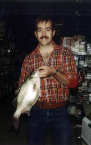 Judith Winebrink holds his state record white bass in 1972