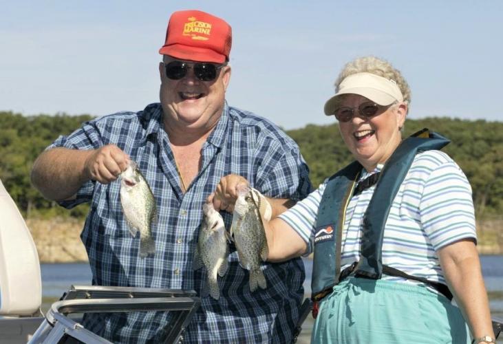 Older couple with fish