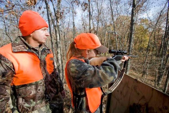 Father and daughter deer hunting