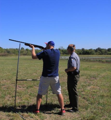 Agent helps man shoot clays 