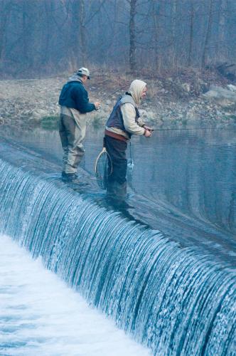 photo of two anglers on the dam at Montauk State Park
