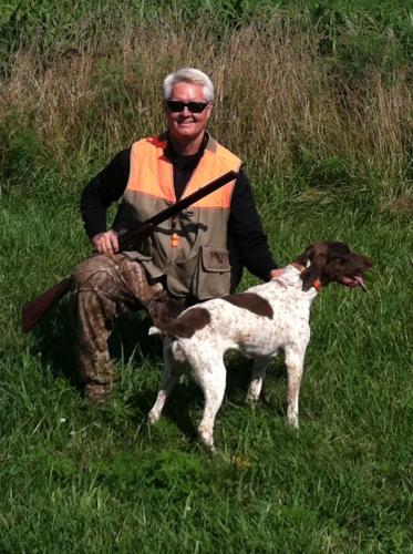 Tim Dollar and his hunting dog