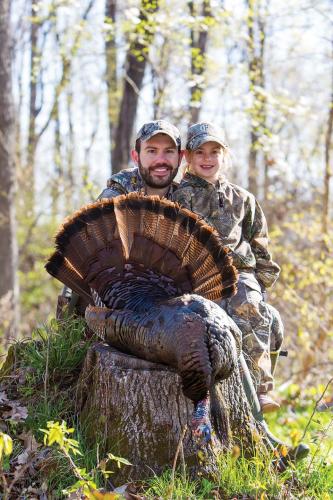 Jake and his daughter with her first turkey